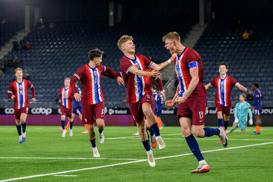 Sindre Walle Egeli and Rasmus Holten of Norway celebrate