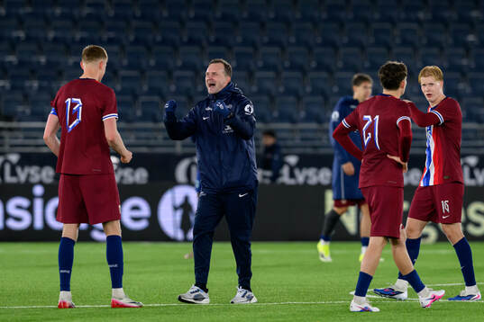 Rasmus Holten and Head coach Jan Peder Jalland of Norway