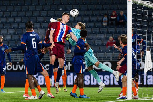 Rasmus Holten of Norway scores the 3-2 goal