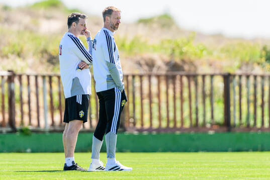 Sports psychologist Daniel Ekvall and head coach Graham