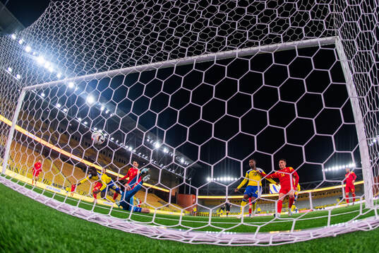 Peter Amoran of Sweden scores 2-2 in competition with
