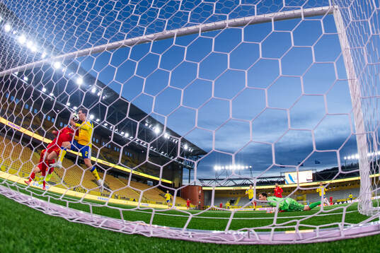 Balsa Mrvaljevic of Montenegro scores 0-1 competing against