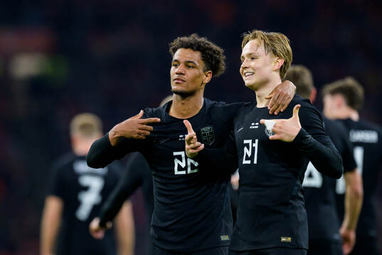 Andreas Schjelderup of Norway celebrates with teammate