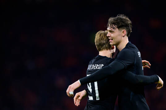 Andreas Schjelderup of Norway celebrates with teammate