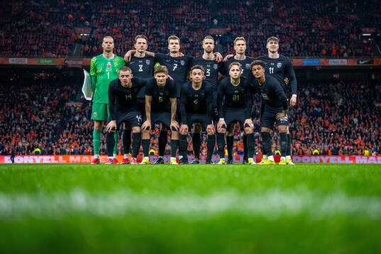 The starting eleven of Norway pose for a team photo