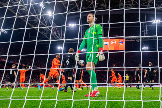 Goalkeeper Ørjan Håskjold Nyland of Norway looks dejected