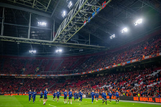Players of Norway warm up