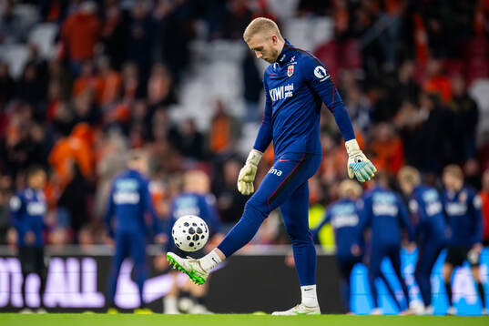 Goalkeeper Egil Selvik of Norway warms up