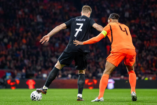 Alexander Sørloth of Norway and Virgil van Dijk of