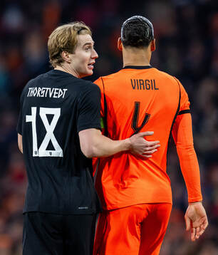 Kristian Thorstvedt of Norway and Virgil van Dijk of