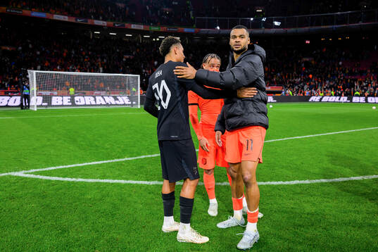 Antonio Nusa of Norway and Cody Gakpo of Netherlands