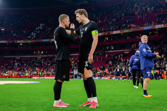 Julian Ryerson and Sander Berge of Norway
