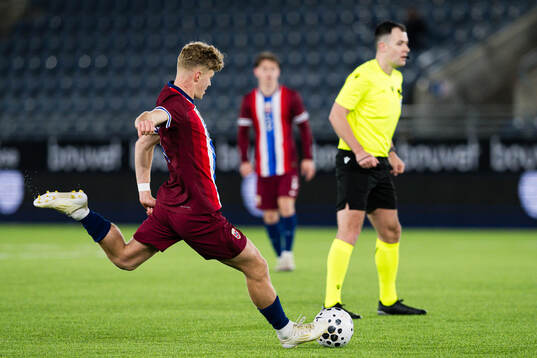 Sindre Walle Egeli of Norway scores the 2-2 goal