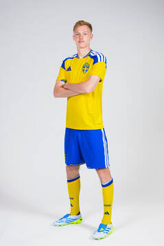 Hugo Larsson of the Swedish national football team poses