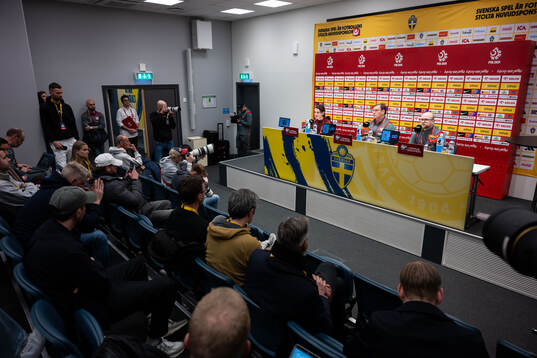 Jakub Kaminski and head coach Jan Urban of the Poland's