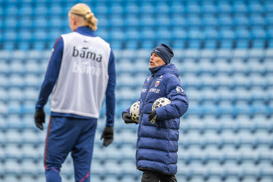 Head coach Ståle Solbakken and Erling Braut Haaland of the