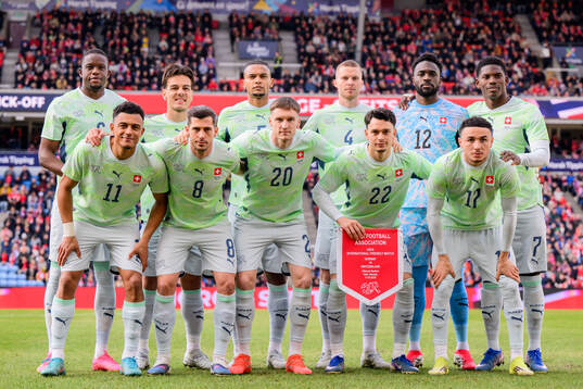 The starting eleven of Switzerland pose for a picture