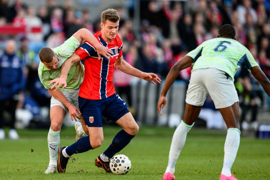 Nico Elvedi of Switzerland and Alexander Sørloth of Norway