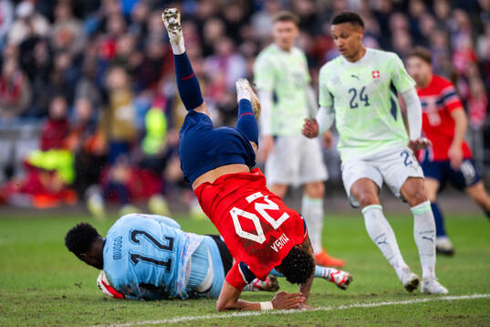 Antonio Nusa of Norway and goalkeeper Yvon Mvogo of