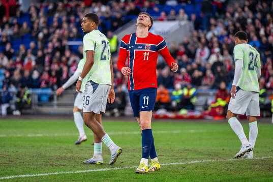 Jørgen Strand Larsen of Norway looks dejected