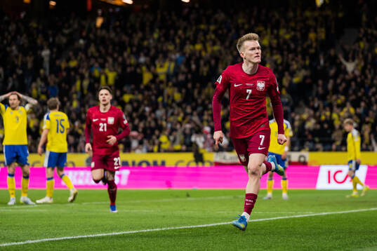 Karol Swiderski of Poland celebrates the 2-2 goal