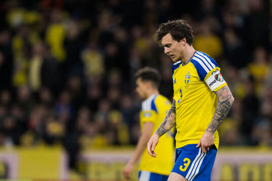 Victor Nilsson Lindelöf of Sweden looks dejected