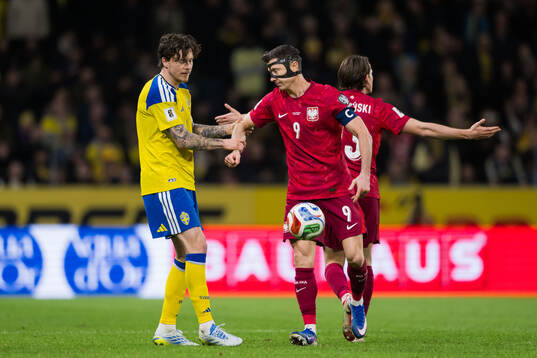 Victor Nilsson Lindelöf of Sweden and Robert Lewandowski