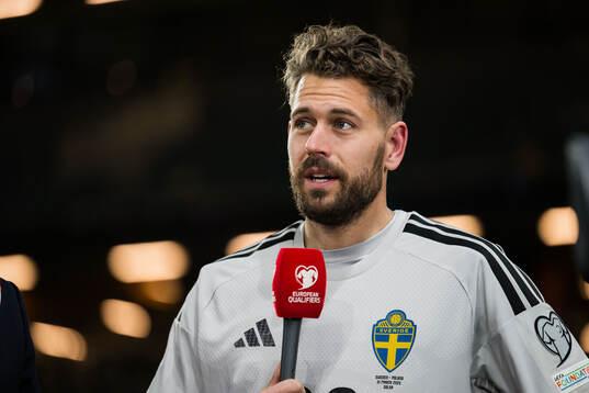 Goalkeeper Kristoffer Nordfeldt of Sweden is being