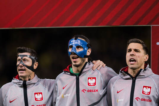 Robert Lewandowski, goalkeeper Kamil Grabara and Jan