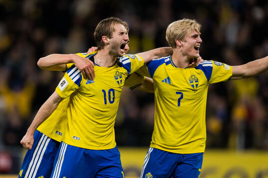 Benjamin Nygren and Lucas Bergvall of Sweden celebrate