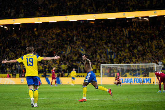 Mattias Svanberg and Anthony Elanga of Sweden celebrate
