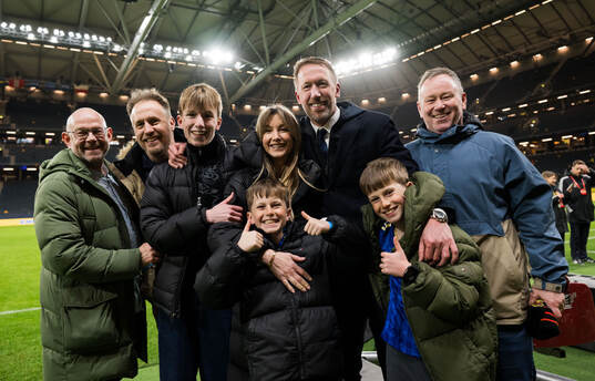 Head coach Graham Potter of Sweden celebrate with family