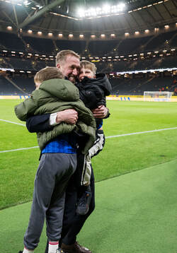 Head coach Graham Potter of Sweden celebrate with family
