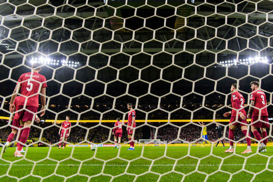 Robert Lewandowski of Poland looks dejected