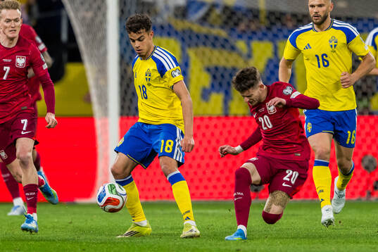 Yasin Ayari of Sweden and Sebastian Szymanski of Poland