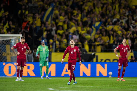 Przemyslaw Wisniewski, goalkeeper Kamil Grabara, Sebastian