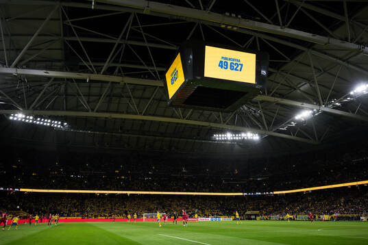 The Jumbotron shows the attendance