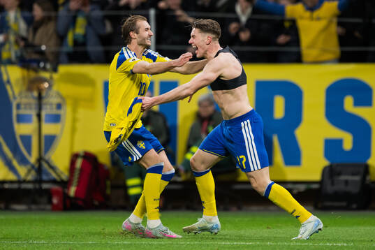 Benjamin Nygren and Viktor Gyökeres of Sweden celebrate