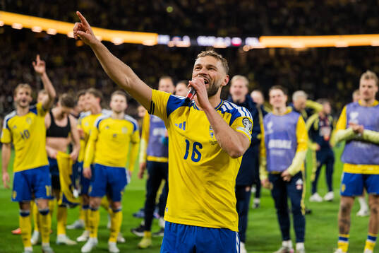 Jesper Karlström of Sweden celebrates