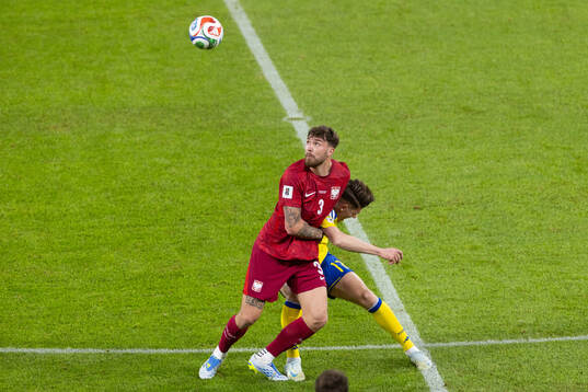 Przemyslaw Wisniewski of Poland and Viktor Gyökeres of