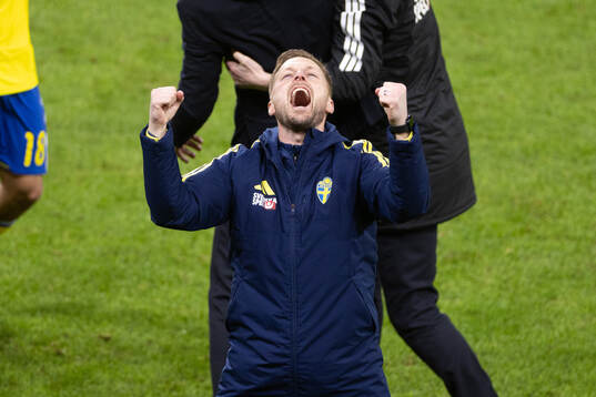 Assistant coach Sebastian Larsson of Sweden celebrates