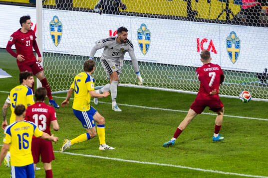 Karol Swiderski of Poland scores 2-2