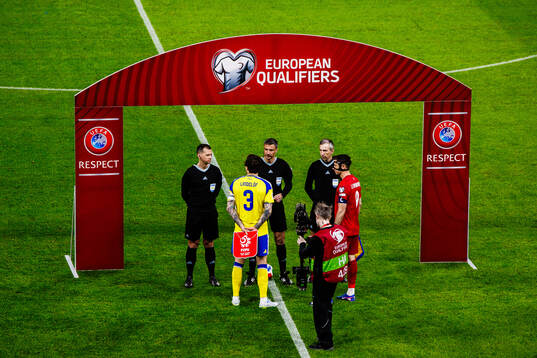 Referee Slavko Vincic, assistant referee Tomaz Klancnik,