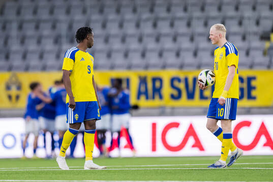 Richie Omorowa and Marcus Rafferty of Sweden looks dejected
