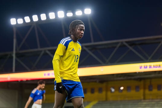 Alieu Njie of Sweden looks dejected