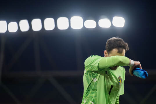 Goalkeeper Elis Bishesari of Sweden looks dejected