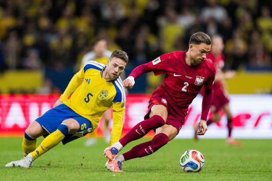 Gabriel Gudmundsson of Sweden and Matty Cash of Poland