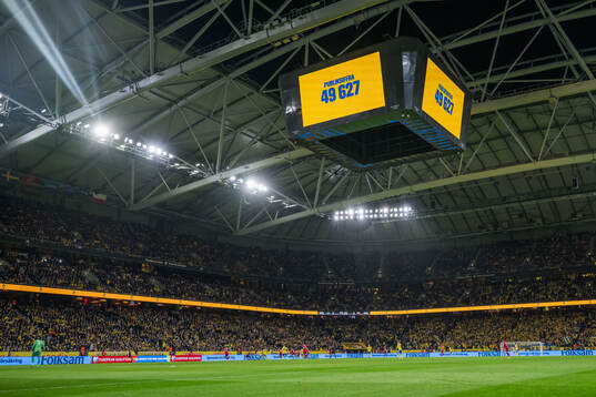The Jumbotron shows the attendance