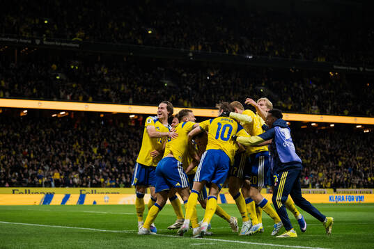 Players of Sweden celebrate