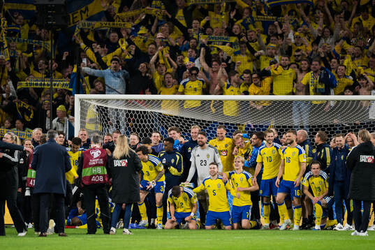 Players of Sweden celebrates